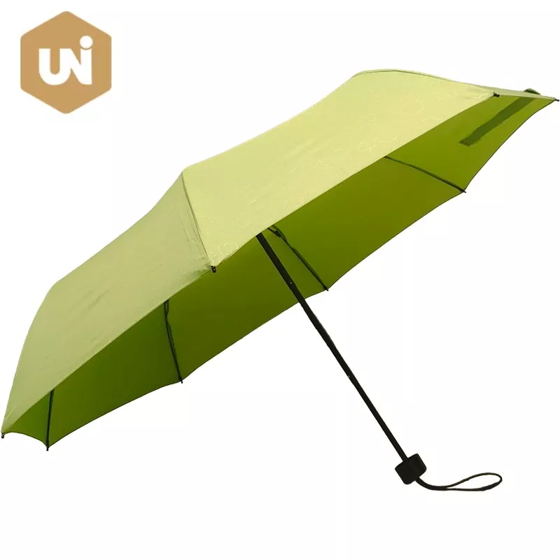 Waarom is de verborgen pongee-paraplu met reliëf ideaal voor weggeefacties voor bedrijfsmerken?